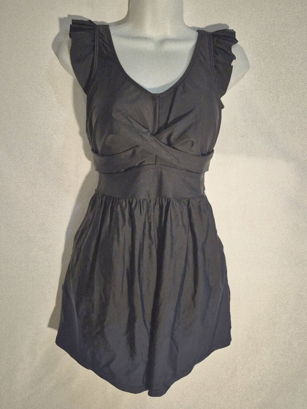 Bloomchic stylish one-piece romper style swimsuit, black in size 12